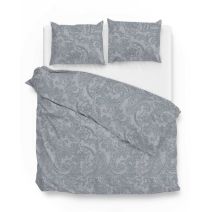 Dekbedovertrek met paisleypatroon in denimkleur op tweepersoons matras met wit hoeslaken