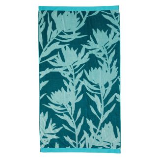 KAAT Amsterdam Bermuda Blue Green strandlaken met tropisch bloemenprint, vooraanzicht