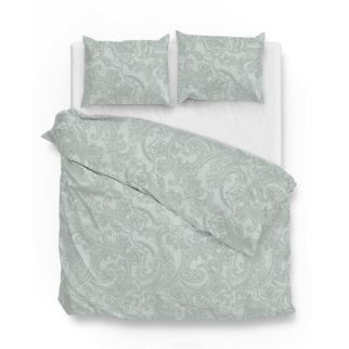 Mintgroen dekbedovertrek met paisley patroon op een tweepersoons matras met wit hoeslaken